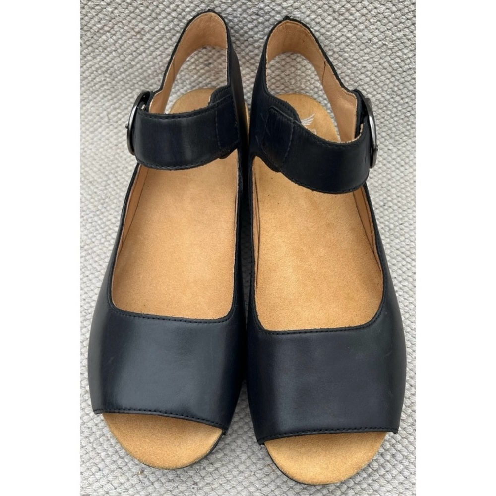 Dansko Black and Tan Sandals with Mary Jane Strap. Small scuff in picture